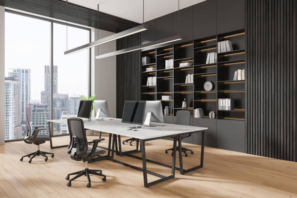 istock Office coworking interior with tables and pc desktop, panoramic window 2172073172