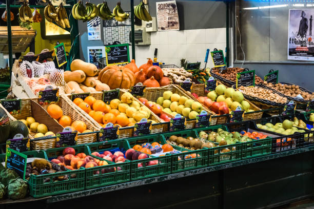 Sete, France - October 19, 2019: A vibrant display of fresh produce at a local market.