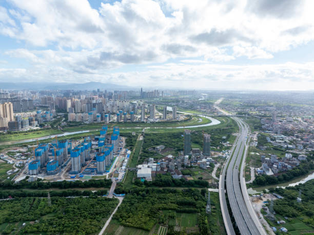 istock Construction site behind suburban vacant land 2172079081