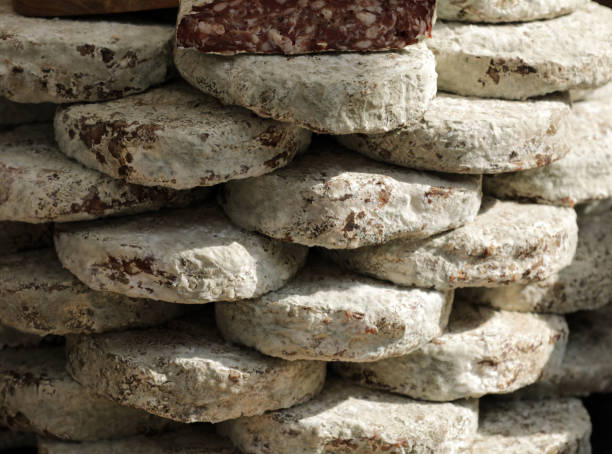 istock Sausage stacked and sliced ​​at a market stall 2172093488