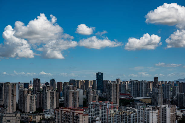istock The city under the blue sky and white clouds 2172096680