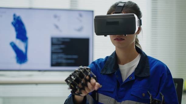 istock The Future of Engineering: A Tradeswoman Powers Robotics with Advanced VR. 2172101029