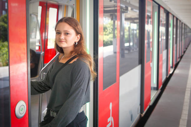 istock Girl entering the subway train 2172103842