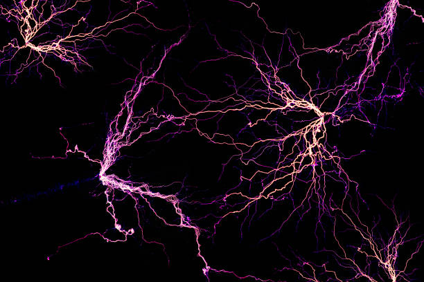 istock Blue and purple electric lighting on black background. 2172105332
