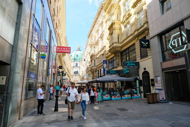 Tourists holding hand at Central Vienna, summer 2024