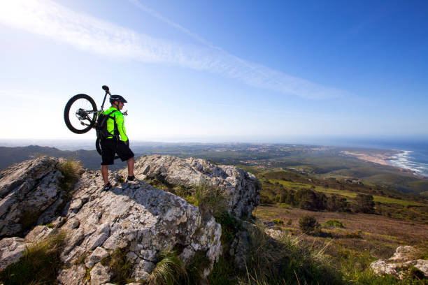 istock Mountain biker riding on his btt bike 2172106583