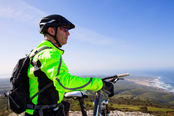 istock Mountain biker riding on his btt bike 2172106599