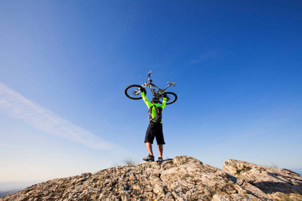 istock Mountain biker riding on his btt bike 2172107167