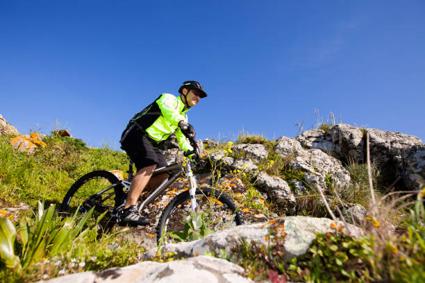 istock Mountain biker riding on his btt bike 2172107210