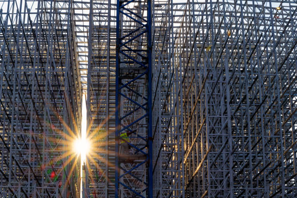 istock Tower crane operator climbing the ladder to his cabin against clad rack structure 2172108350