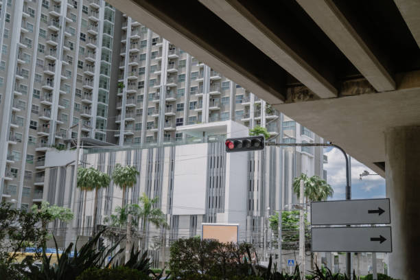 istock Traffic signs under overpasses in cities with high-rise buildings 2172117115