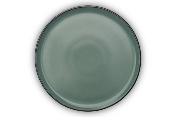 istock Top view of single empty green ceramic plate with black edge. 2172118850