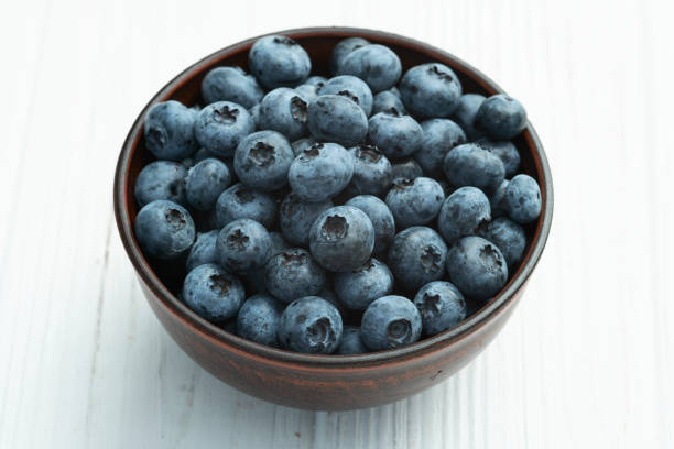 istock Blueberry photography in a bowl on rustic background 2172122591