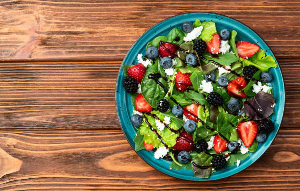 istock Berries salad (blueberry strawberry blackberry ) with cheese feta and balsamic sauce 2172122594