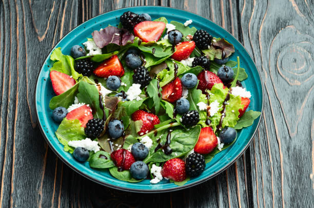 istock Berries salad (blueberry strawberry blackberry ) with cheese feta and balsamic sauce 2172122598