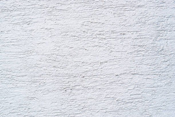 istock Close-Up of Textured White Stucco Surface 2172124418