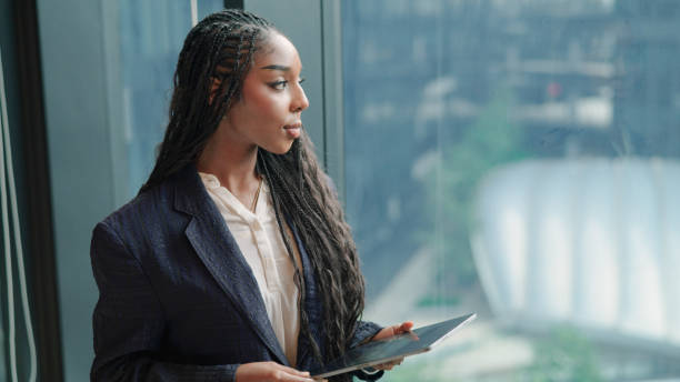istock African businesswoman using tablet to working 2172126853