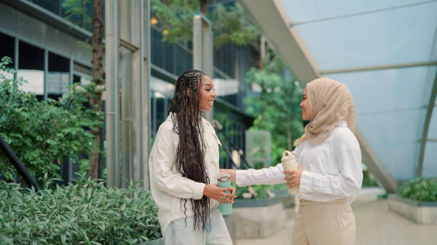 istock Two businesswoman talking together during break 2172127234