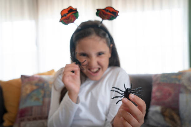 istock Children playing with Halloween decoration 2172128924