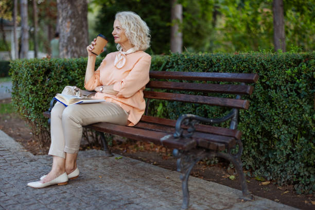 istock Senior Woman Relaxing Outside 2172129154