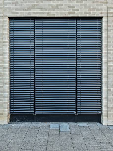 istock The exit is blocked by a gate that looks like a Venetian blind. 2172132351