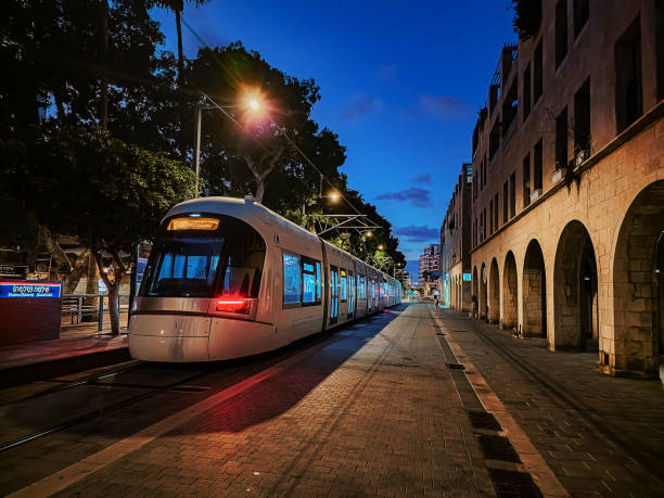 istock Modern tram at night on city street 2172139103