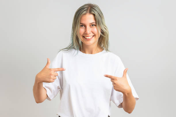 istock Young woman points at herself with both index fingers 2172145789