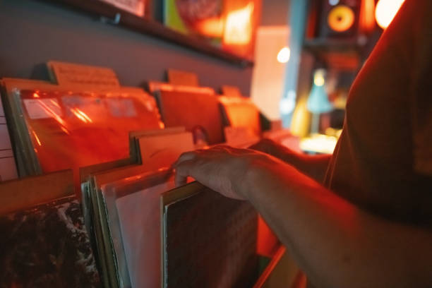 Close-up of a man's hands choosing vinyl records