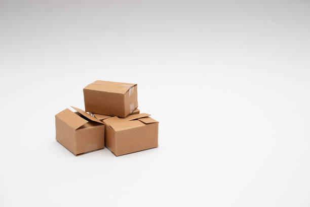 Small cardboard boxes ready for transportation and delivery. Free space for text.