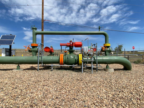 Natural Gas Valve Equipment Broomfield, CO, USA- Sept14, 2024: A Natural Gas shut-off valve is seen as the pipeline emerges from below ground. This Station allows the flow of gas to be controlled remotely. Fossil Fuels are a hot topic in the Global-Warming Conversation. natural gas extraction stock pictures, royalty-free photos & images