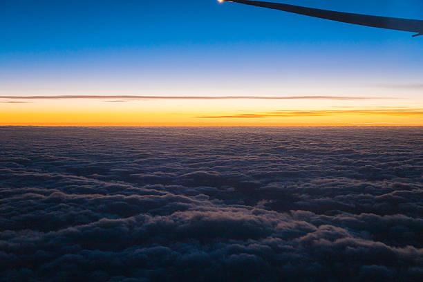 istock China Shanghai - Sunrise above the clouds from the plane 2172152749