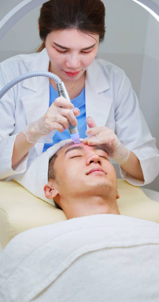 istock asian beautician use beauty tool 2172156109