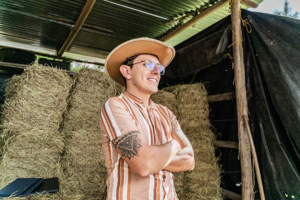 istock Young man contemplating on a farm 2172162919