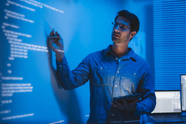 A seminar and workshop on coding to enhance system efficiency. stock photo