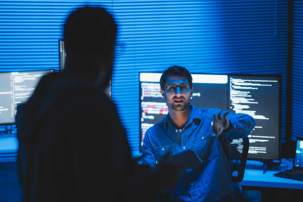 A seminar and workshop on coding to enhance system efficiency. The software developer conducting a seminar and workshop on coding to enhance system efficiency. machine learning engineer stock pictures, royalty-free photos & images