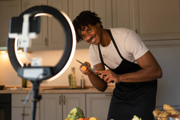 istock Smiling chef recording a cooking video 2172168343