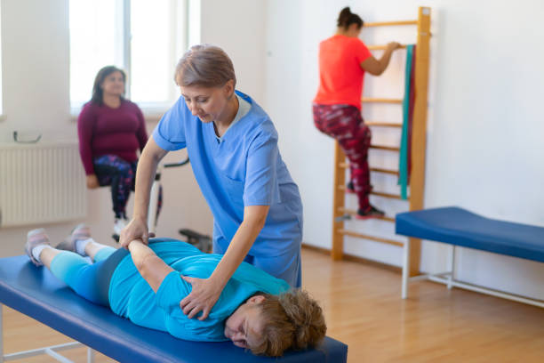 istock Rehabilitation therapy for leg injury 2172168825