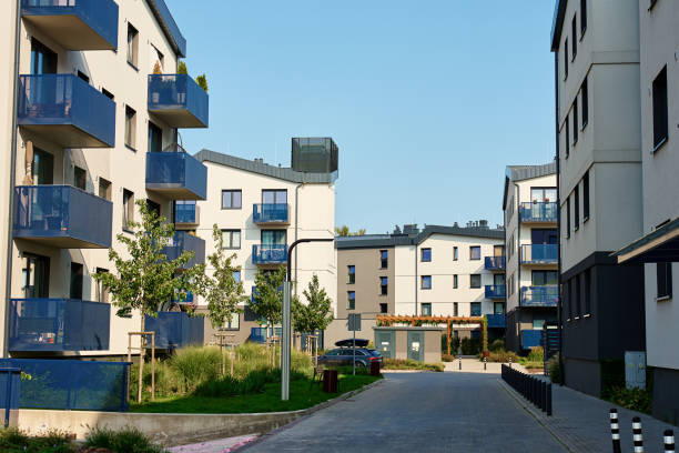 istock Modern Apartment Building with Green Lawn and Trees 2172170983