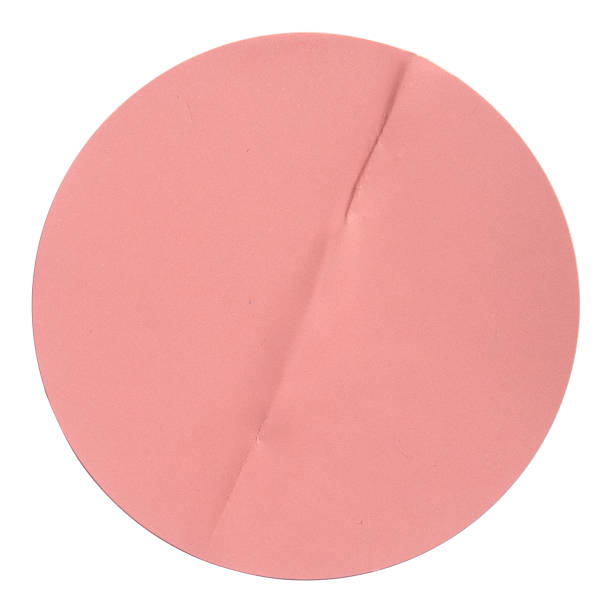 istock blank pink round adhesive paper sticker label isolated on white background. 2172174601