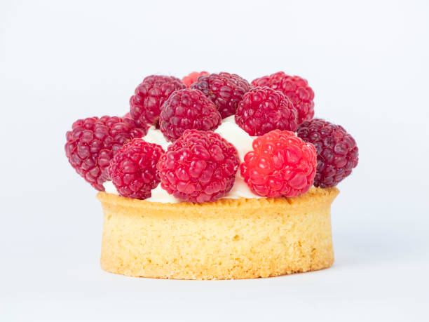 istock A small pastry with a raspberry filling sits on a white background 2172175863