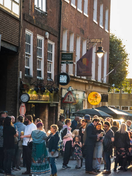 Worcester,England/UK-September 14 2024: People attending the annual celebration of live music,socialize and mingle,outside a popular Worcester city center pub.