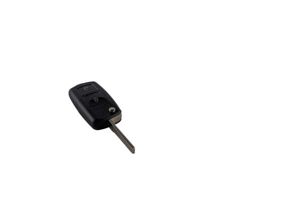 Car keys on a white background in a protective case, securing the car against theft by a car thief