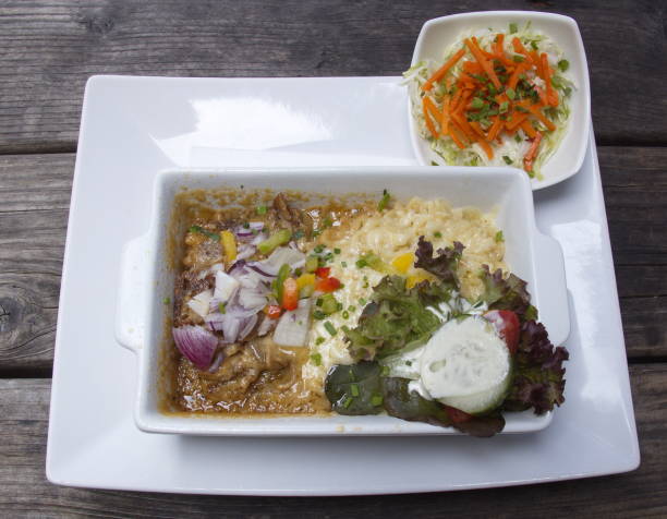 istock Gyros in Metaxa sauce with gratinated Kritharaki noodles 2172188362