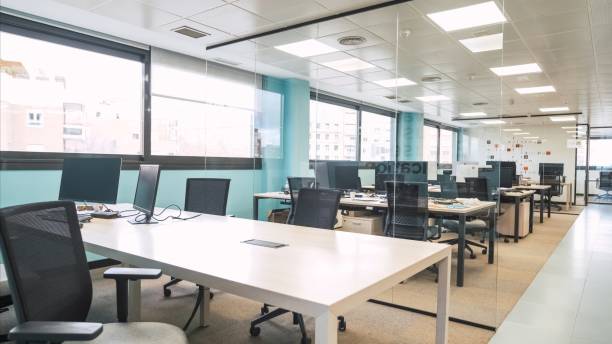 istock Interior of bright creative coworking workspace with computer desks 2172199114