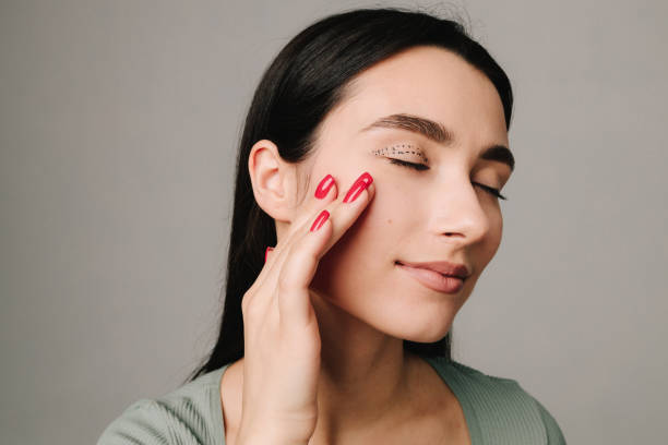 istock Preparing for blepharoplasty to do effective face lifting, remove excess skin and wrinkles from eyelids. Woman is showing well done contour for eye lids surgery. 2172199683