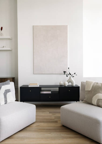 istock Living room interior with white couches and black cabinet 2172208408