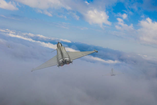 istock Jet aircrafts flying over the clouds. 2172210764