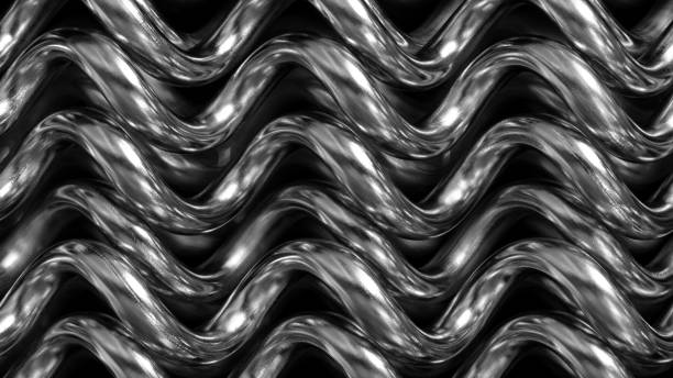 istock A silver metal object with a wavy pattern. The pattern is made up of many small lines that are all connected. The object is shiny and reflective, giving it a modern and sleek appearance 2172219045