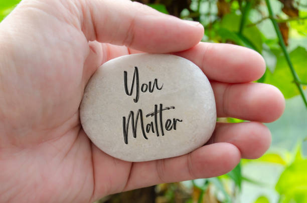 istock You Matter text engraved on white stone. Motivational and inspirational concept 2172223877