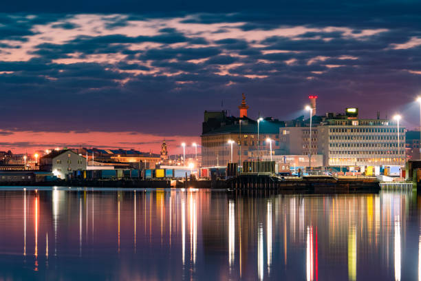 istock Industrial area and waterfront at dusk 2172227008